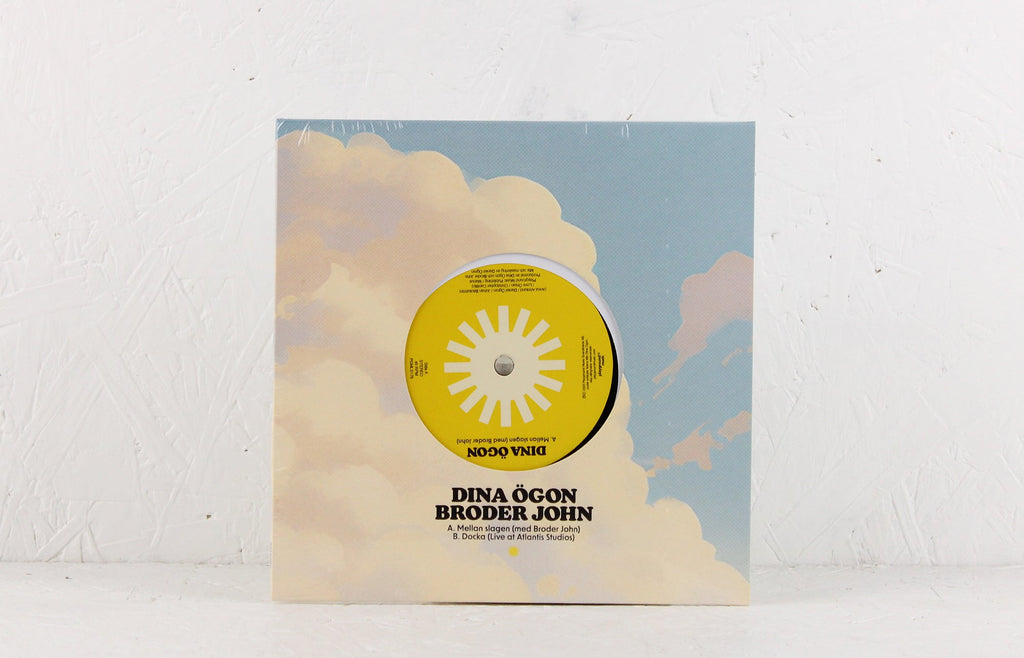 Mellan slagen (med Broder John) / Docka (Live at Atlantis Studios) – Vinyl 7"
